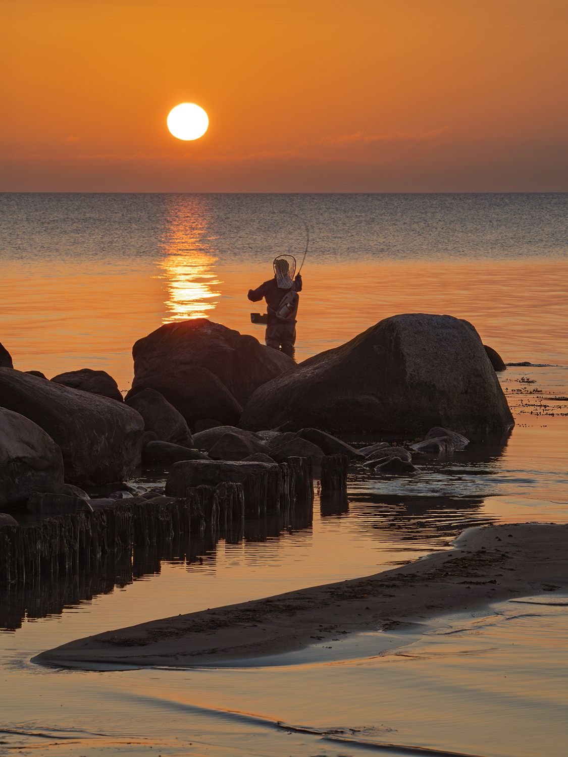 der frühe Angler...