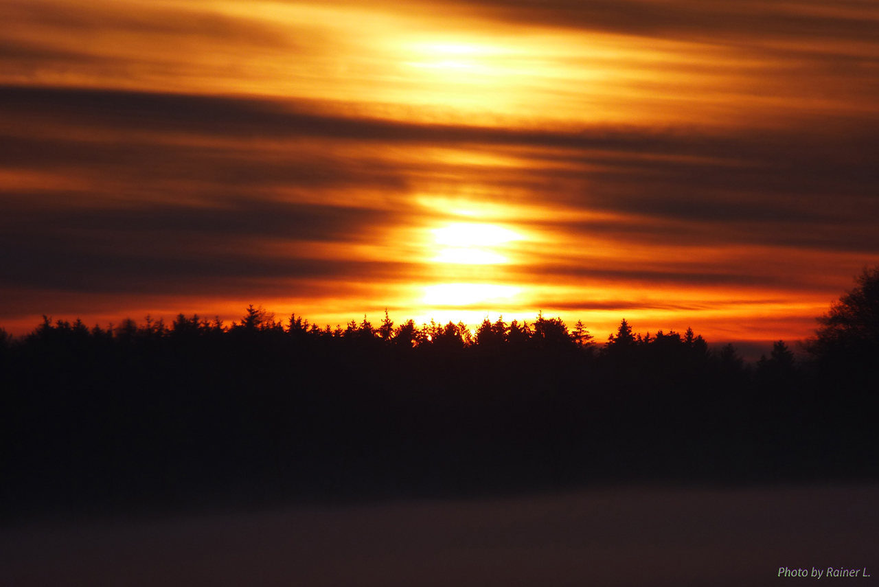 Sonnenuntergang bei Frost und Schnee